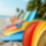 Colorful foam surfboards lined up on a beach