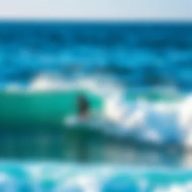 Surfer in Action on Bali's Waves Surfer catching a wave with vibrant ocean backdrop