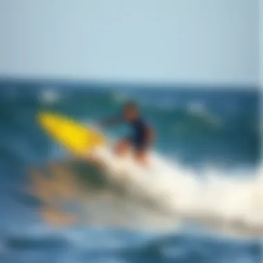 Surfer riding a wave on a Body Glove inflatable surfboard