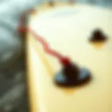 Detailed view of a boogie board string showcasing its connection to the board