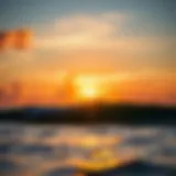 A stunning sunset over the waves of Maui, showcasing the beauty of the ocean.