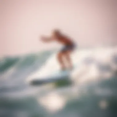 Surfer on Inflatable SUP Dynamic surfer riding an inflatable SUP on a wave