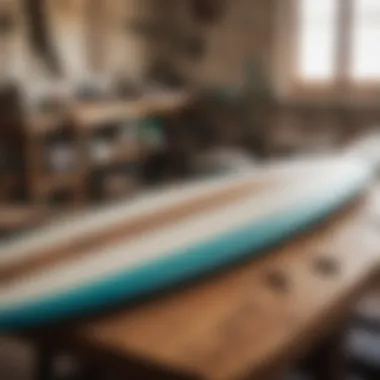 A beautifully shaped surfboard on a crafting table