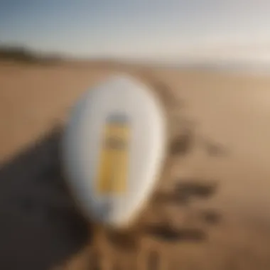 Finished surfboard displayed on the beach