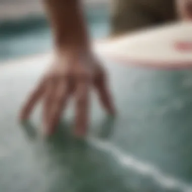 Close-up of resin application on a surfboard