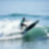 Electric Surfboard in Action Electric surfboard gliding over waves