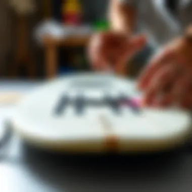 Maintaining Skimboard Stomp Pads Skimboard stomp pads being cleaned and maintained