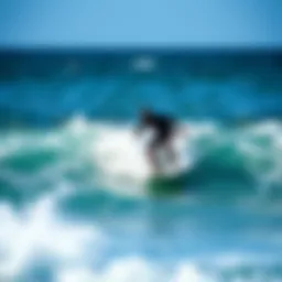 Surfer practicing on the waves