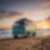 A sleek big wave campervan parked beside a stunning beach at sunset