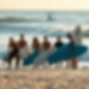 Group of surfers of different skill levels enjoying the beach with soft top surfboards