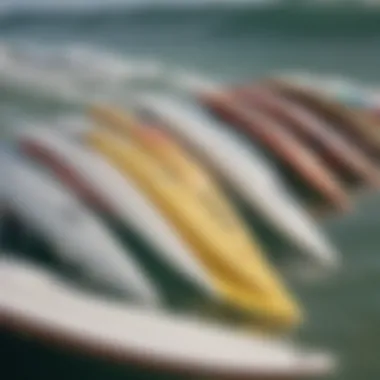 Different types of FCS original fins arranged on a surfboard
