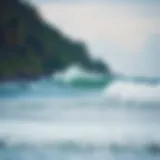 A serene beach with gentle waves perfect for beginners