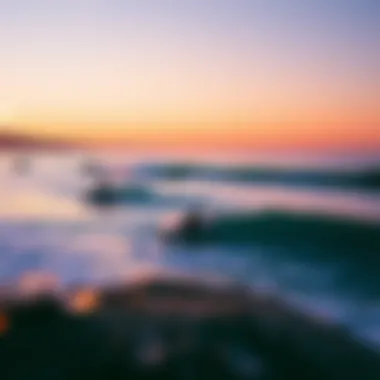 Malibu Sunset Surfing Sunset view at Malibu beach with surfers catching waves