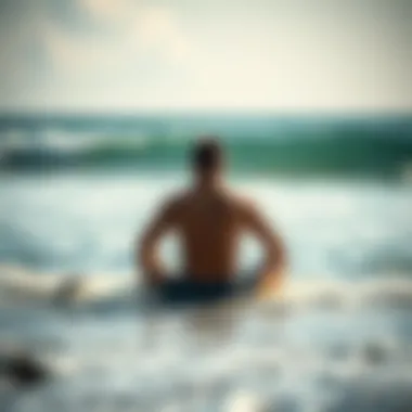 Surfer enjoying the tranquility of ocean sounds while meditating by the shore