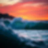 Vibrant ocean waves crashing against surfboards during sunset