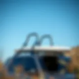 Soft Roof Rack Design for Paddle Boards A sleek soft roof rack designed for paddle boards mounted on a vehicle