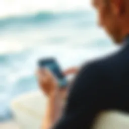 A surfer checking wave conditions on a smartphone app