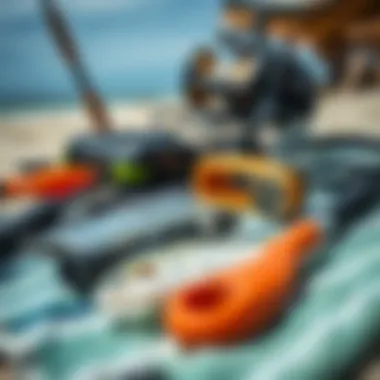 Essential Surf Fishing Gear A collection of surf fishing gear neatly arranged on a beach towel, highlighting essential tools for anglers.