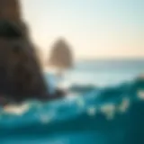 Stunning view of Cabo San Lucas coastline with surfers riding waves