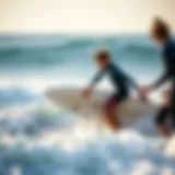 Surfing instructor guiding a student on the waves