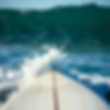 Surfboard Riding the Perfect Wave Close-up of surfboard in motion with waves in the background