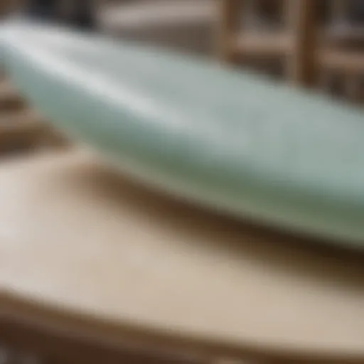 A detailed view of surfboard materials showcasing foam and fiberglass layers