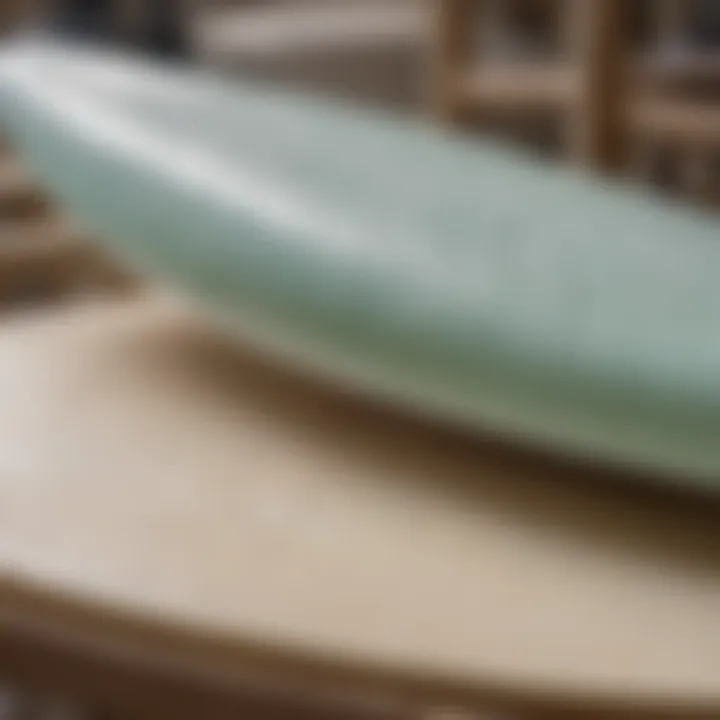 A detailed view of surfboard materials showcasing foam and fiberglass layers