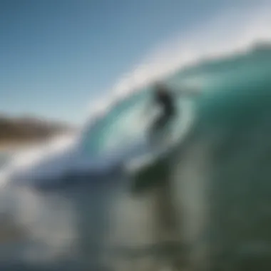 A surfer riding a wave at a popular Bay Area beach