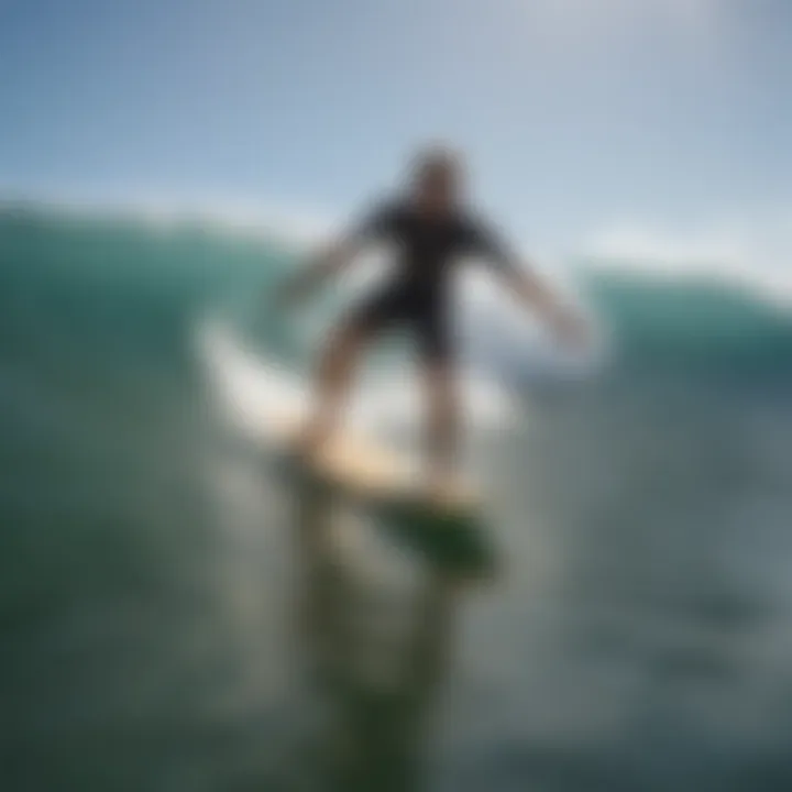 A surfer riding a traditional longboard in perfect wave conditions.