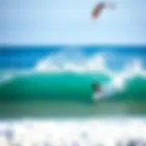 A surfer catching a wave at a popular beach near Los Angeles