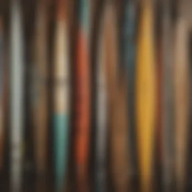 Different types of surfboard leashes displayed on a wooden surface