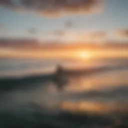 A vibrant sunset over the Pacific Ocean with surfers riding waves