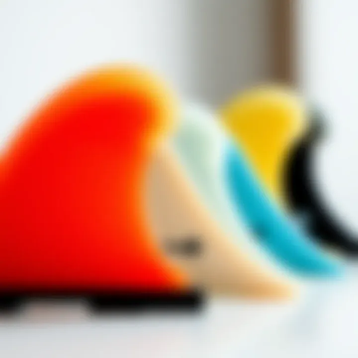 A close-up of surfboard fins showcasing different materials used