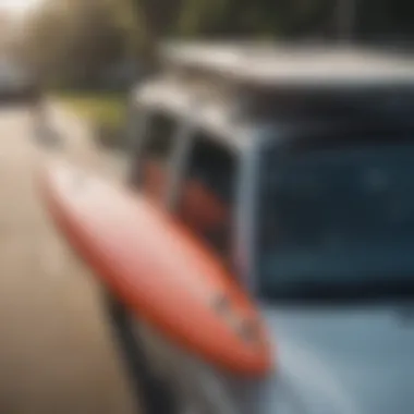 Properly secured surfboard on a car roof