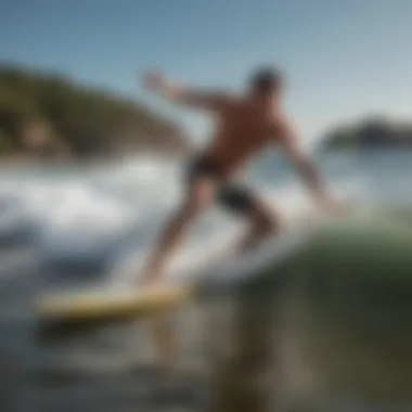 Skimboarder executing a dynamic maneuver on the water's edge.