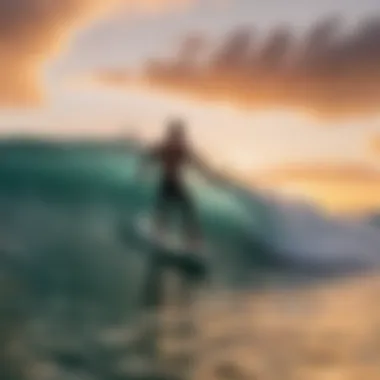 A surfer catching a wave at sunset in Aruba