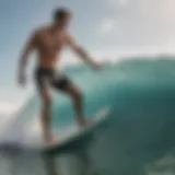 Dynamic surfing action showing swim trunks in use