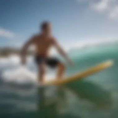 Action shot of a surfer riding a wave using a boogie board, demonstrating advanced techniques