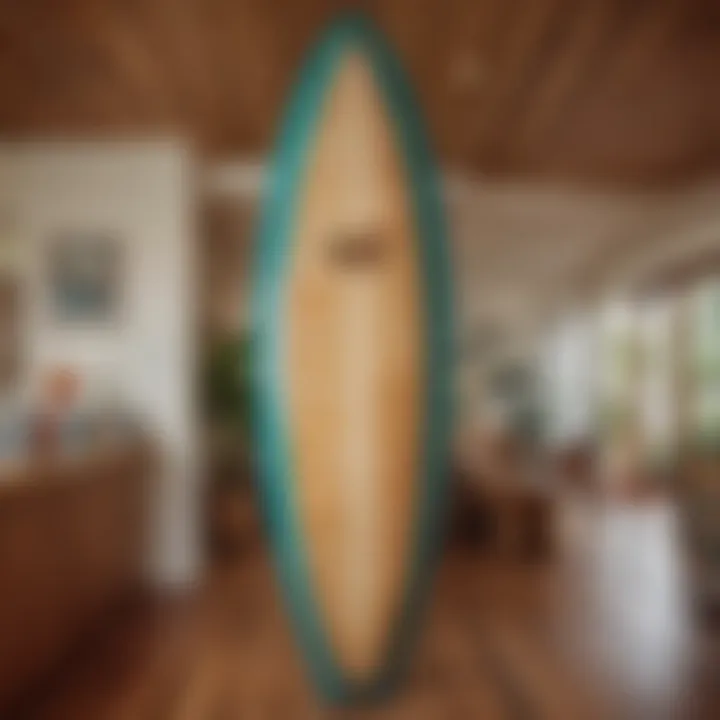 An intricately designed surfboard displayed in the Surfjack's lobby