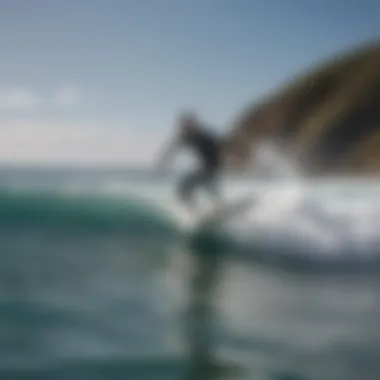 Surfer maneuvering with water jet surfboard