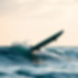 An e foiling surfboard glides effortlessly above the water's surface, showcasing its innovative technology.