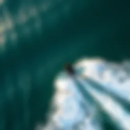 Aerial view of a foil boarder gliding over the water