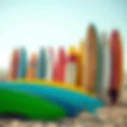 A colorful array of fun shape surfboards displayed on the beach