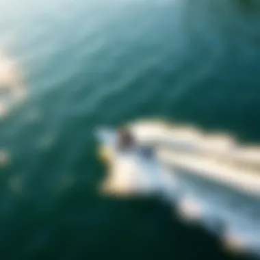 Gliding Across the Water An aerial view of a wakeskater gliding across the water