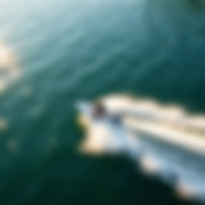 Gliding Across the Water An aerial view of a wakeskater gliding across the water