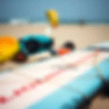 Essential Equipment Overview A close-up view of essential kite surfing equipment laid out on the beach