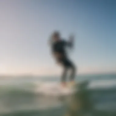 Instructor guiding a novice kitesurfer