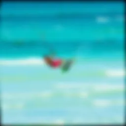 A vibrant kitesurfer soaring above the turquoise waters of the Outer Banks