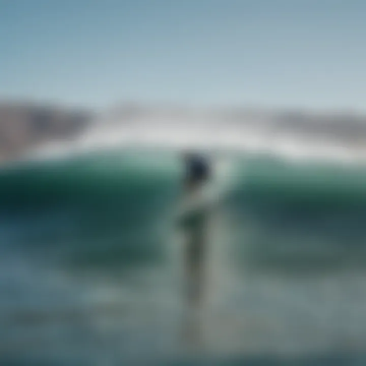 Surfer riding a wave at Los Barriles