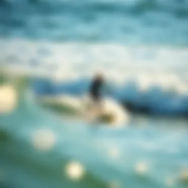 A surfer paddling out into the ocean